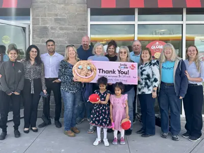 Picture of Friends of the Library with a Cheque from a Smile Cookie Campaign in 2026. Photo is courtesy of OrilliaMatters